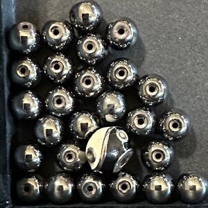 15.  Hematite Beads with One Black & White Bead